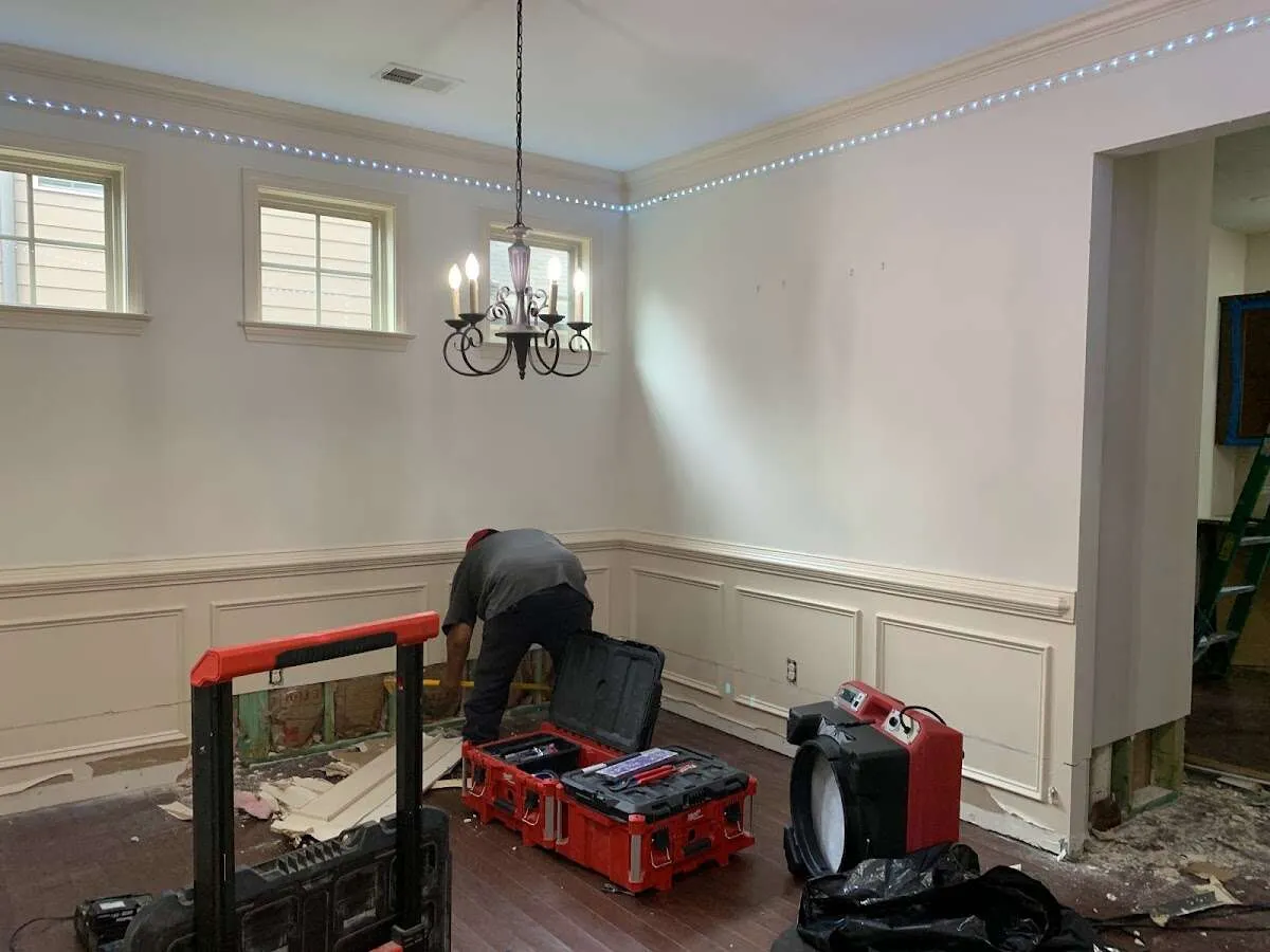 Restoration technician with professional equipment in Oak Lawn